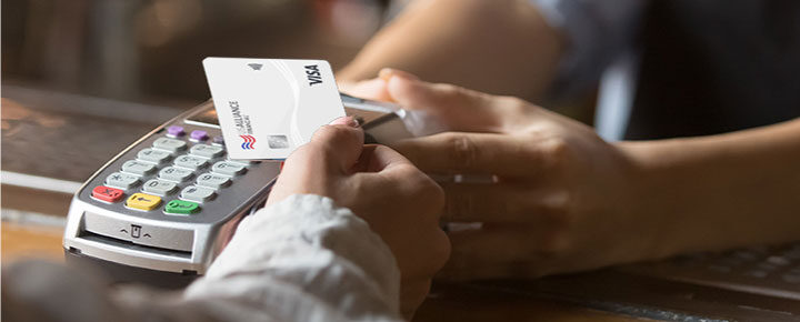 US Alliancecustomer paying with their Visa Classic Credit Card